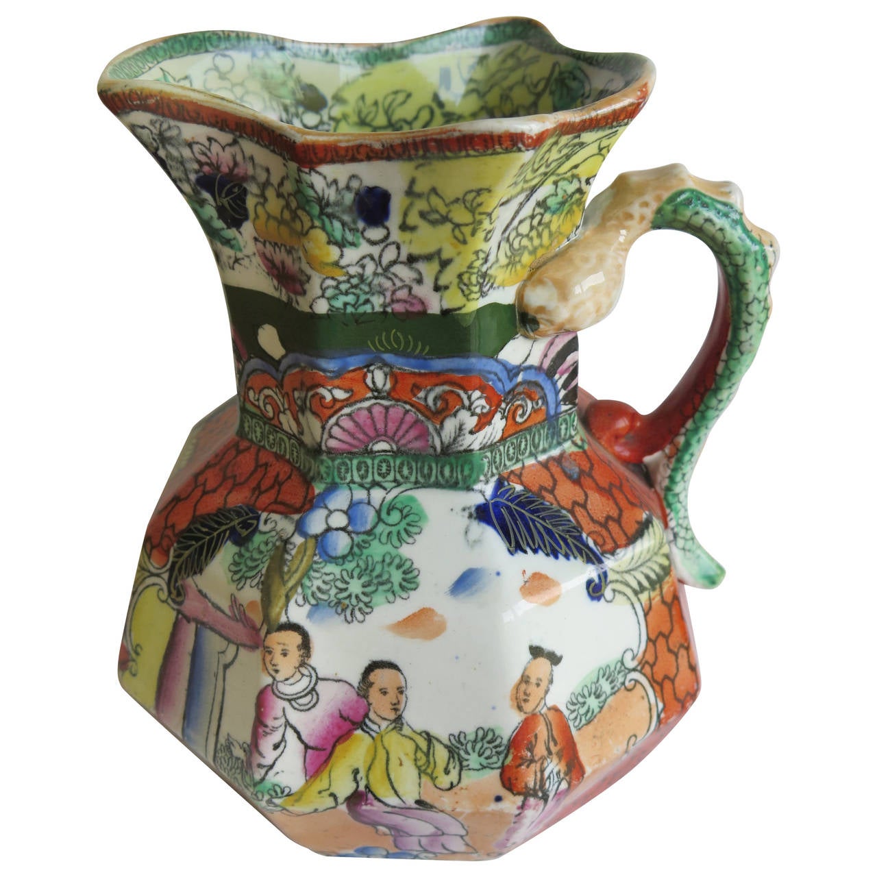 This is a very good Hydra Jug or pitcher by Mason's Ironstone, England. 

The Jug is octagonal in shape with the snake handle. These jugs were made   in a range of sizes, varying from a small of under three inches high to larger, ones such as this