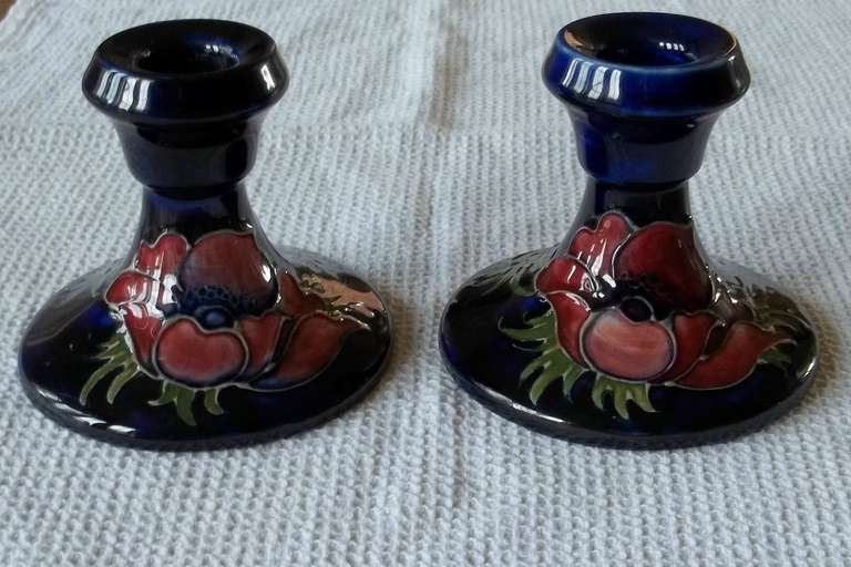 These are a good pair of MOORCROFT Pottery  CANDLESTICKS in the 