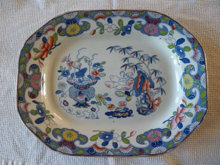 This a large, Early 19th Century Meat Platter of 14.5 inch width made by Mason's Ironstone in the Bamboo and Basket Chinoiserie pattern, Ca 1815.

Very early 19th century Mason's Ironstone platters are rare and this is a fine heavy example in very