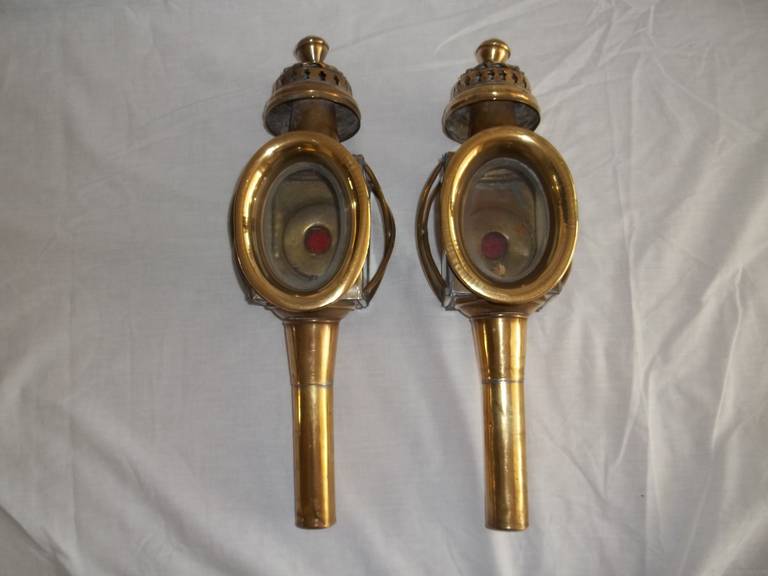 These are a very good PAIR of Carriage Lamps.

A lot of these lamps are were made from iron / steel and as such suffer very badly from corrosion, whereas these lamps have an all-brass body. 

These lamps are in good original condition and still