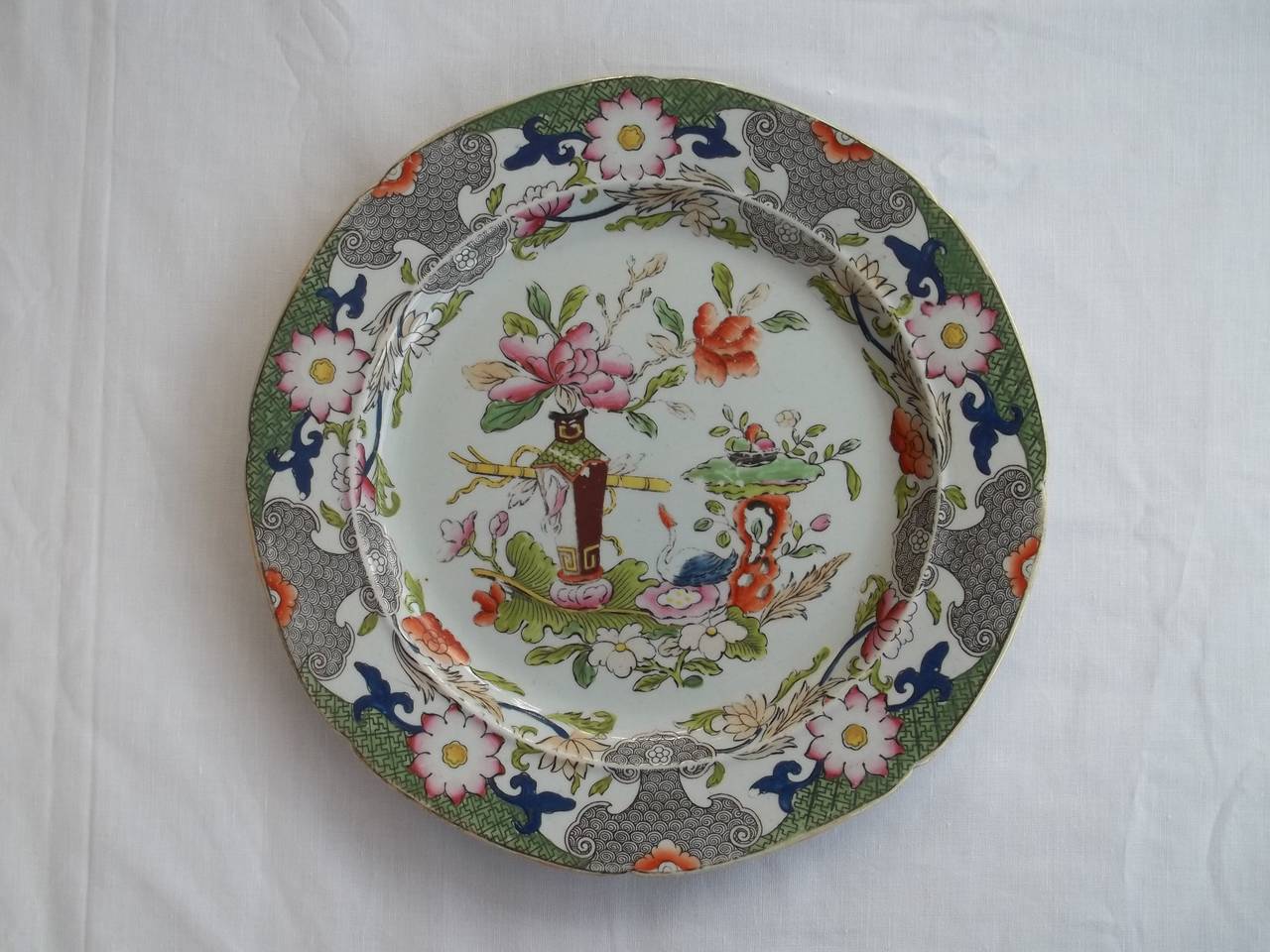 This is a harlequin set of SIX MASONs Ironstone Plates, all dating to the earliest period between 1813 and 1820. 

All the plates are the same size and shape, but have different patterns and base marks as follows; 

Top row left: Japan Basket