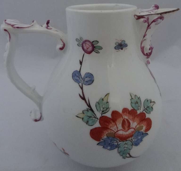 Meissen Porcelain Milk Jug, without cover,decorated in the Kakiemon style and exhibiting the potting into the pear-shape and creating the moulded and scrolled spout using the uniformly thickly potted hardpaste porcelain and also the 'J' shaped