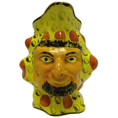 Staffordshire Yellow Ground Mask Jug