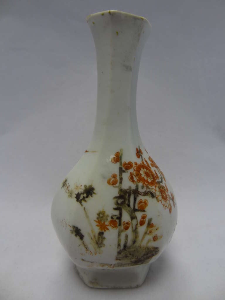 An extremely rare small Worcester First Period Hexagonal Vase. Decorated finely in the kakiemon palette.The stem of the vase appears to have partially collapsed on one side and the chip together with a small hairline crack on the stem reveal a piece