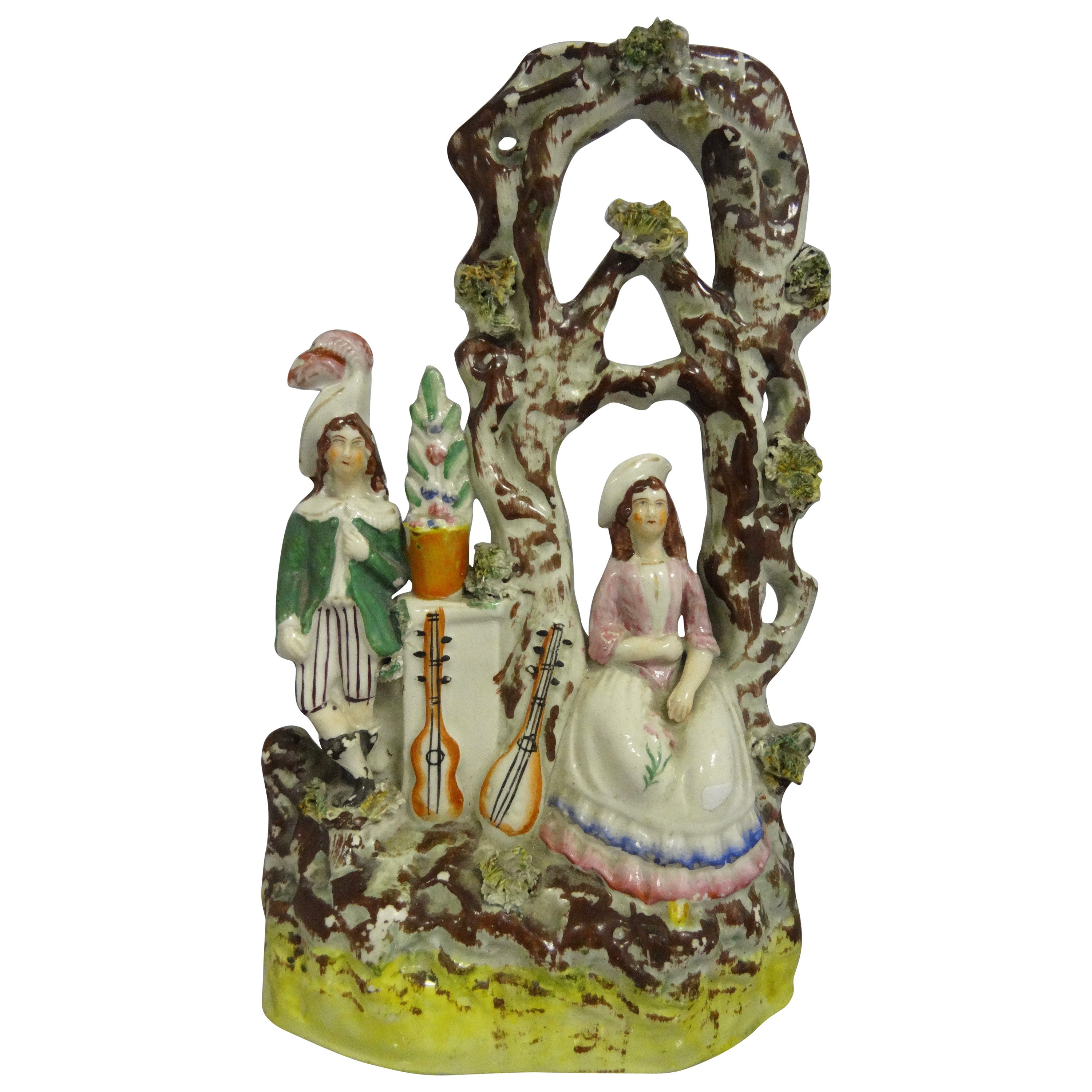 Staffordshire Flatback Composition of Two Musicians in a Bower