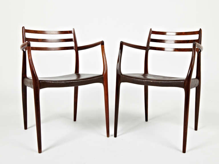 This listing is for 2 carvers and 6 side chairs designed by Niels Otto Møller in 1962. This set is made of the most brilliant rosewood that Paere Dansk has made available in 12 years of trading. (To avoid any confusion, the pictures show 10 side