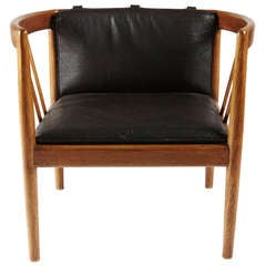 Illum Wikkelso Lounge Chair in Teak and Original Black Leather