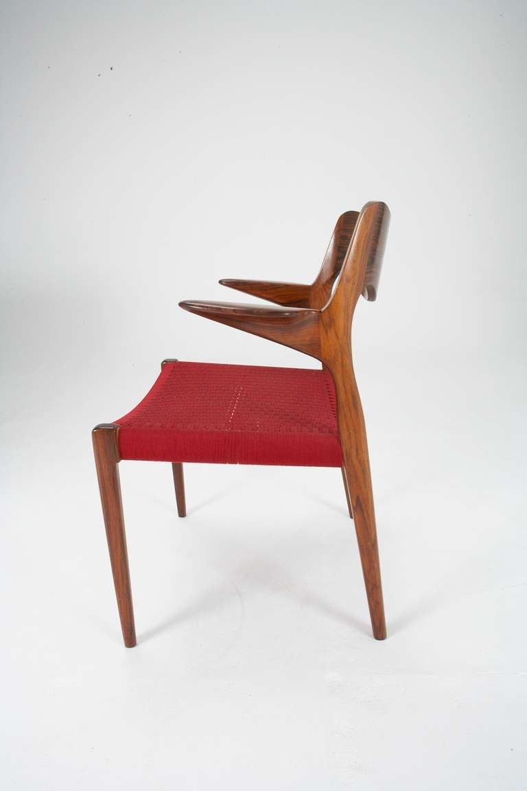 Original set of 12 rosewood dining chairs by Arne Hovmand Olsen In Excellent Condition In London, GB
