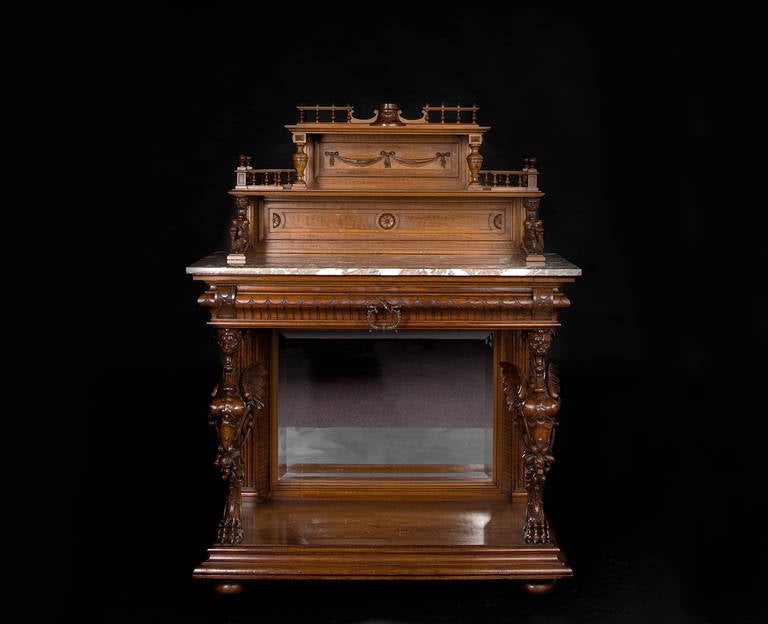 Renaissance corner or working table with woodcarving, mirror and marble top. Beautiful carving on both legs, one drawer. This Renaissance piece of table is a fine example of the transition period in Austria during the reign of the Habsburg Monarchy.