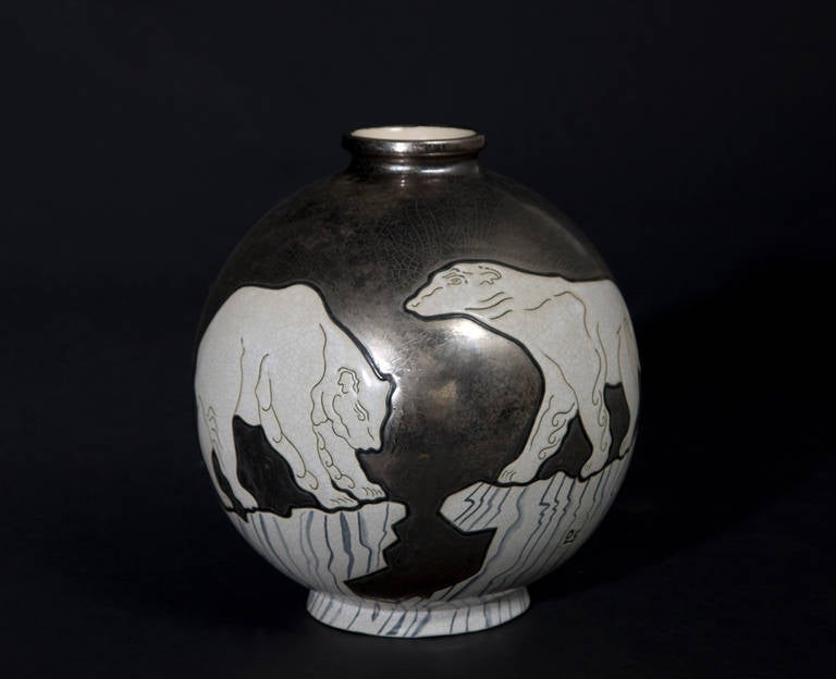Vase polar bear by Danillo Curetti. "Emaux de Longwy" Nr 2/50.
A young contemporary artist from Switzerland who worked together with the Faïenceries in Longwy for six years. Started his own pottery in Switzerland, November 1989. His