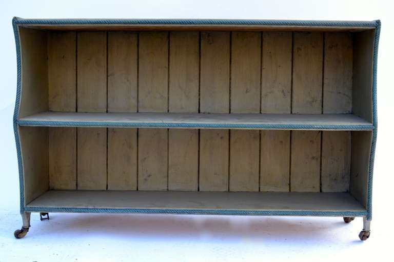 low bookcase under window