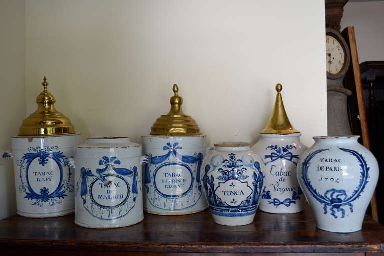 Kim Faison Antiques has an collection of Delft Tobacco Jars for sale from $2800-$4600.  Prices and dimensions vary per item.  Contact us for information.