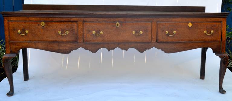 18th century three-drawer English Queen Ann dresser base.