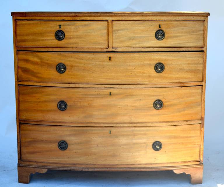 Early 19th Century English Blonde Mahogany Bow front Chest of Drawers