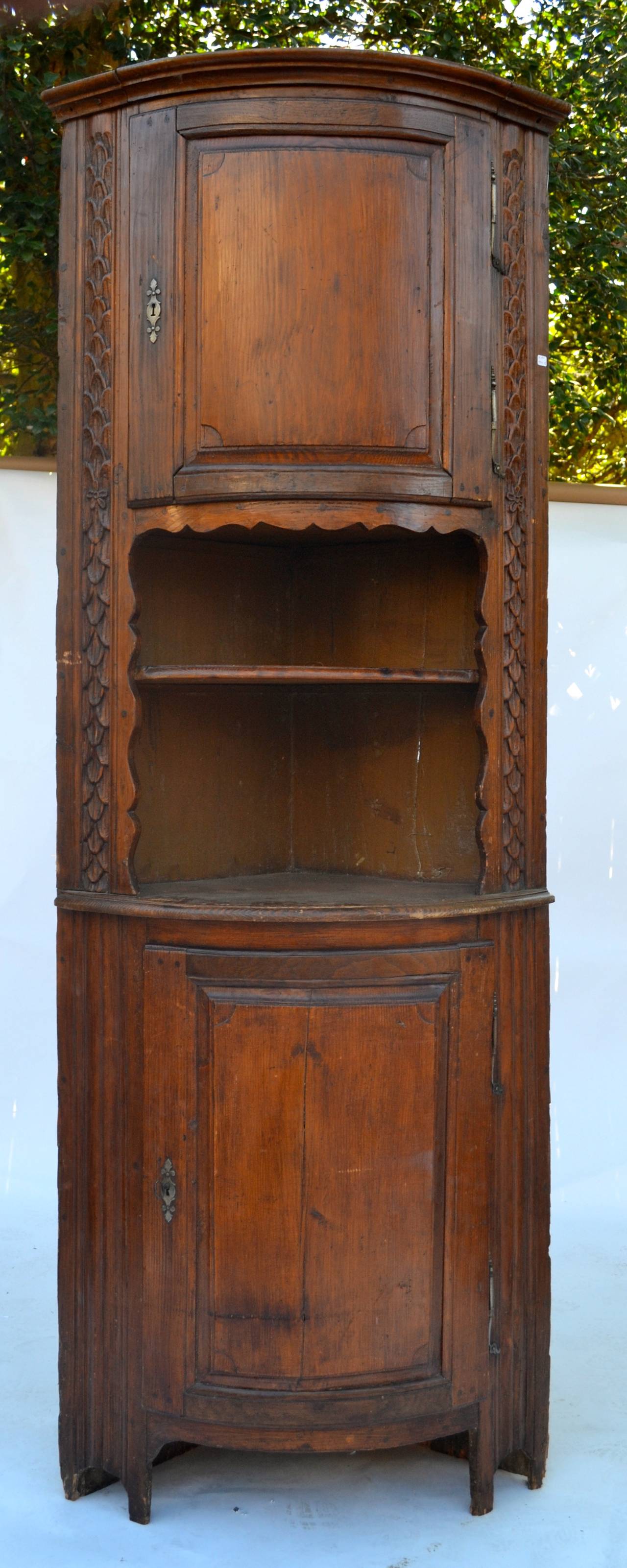 18th Century Tall French Corner Cupboard with Carved Edges