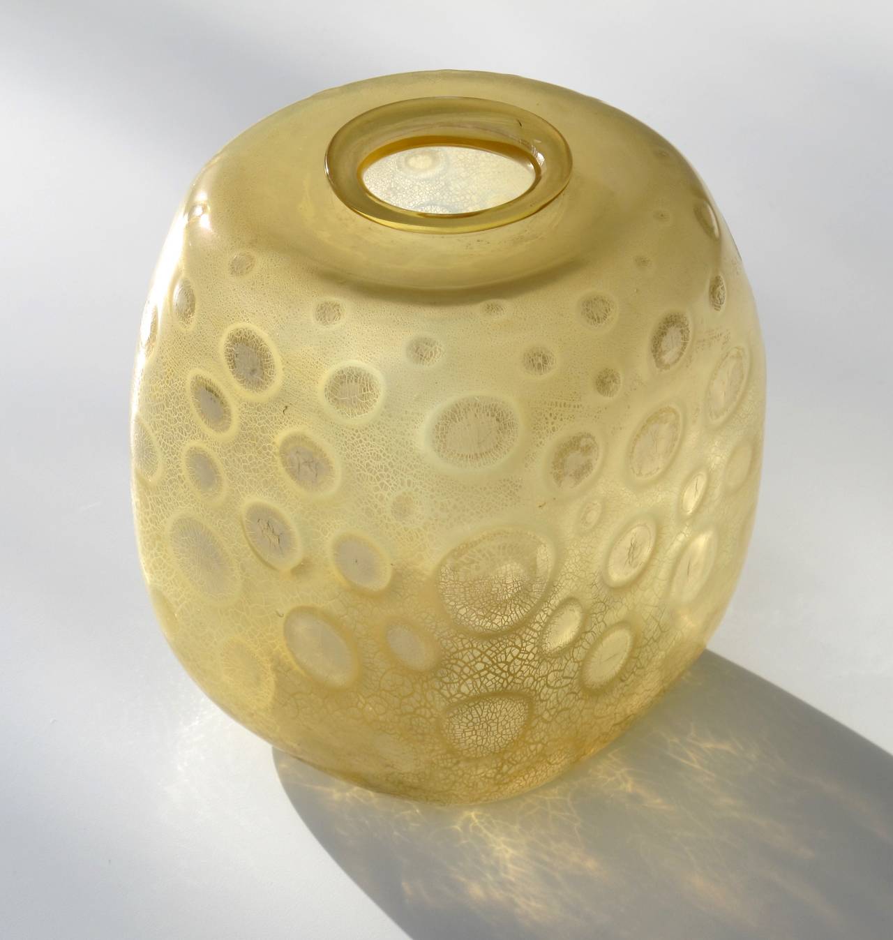This beautiful serica glass with a tin crackle was made by A.D. Copier for the Royal Glassworks in Leerdam. The Leerdam Serica are glass designs from the Art Deco period, that were produced in small series. This is the quite rare squarish Serica