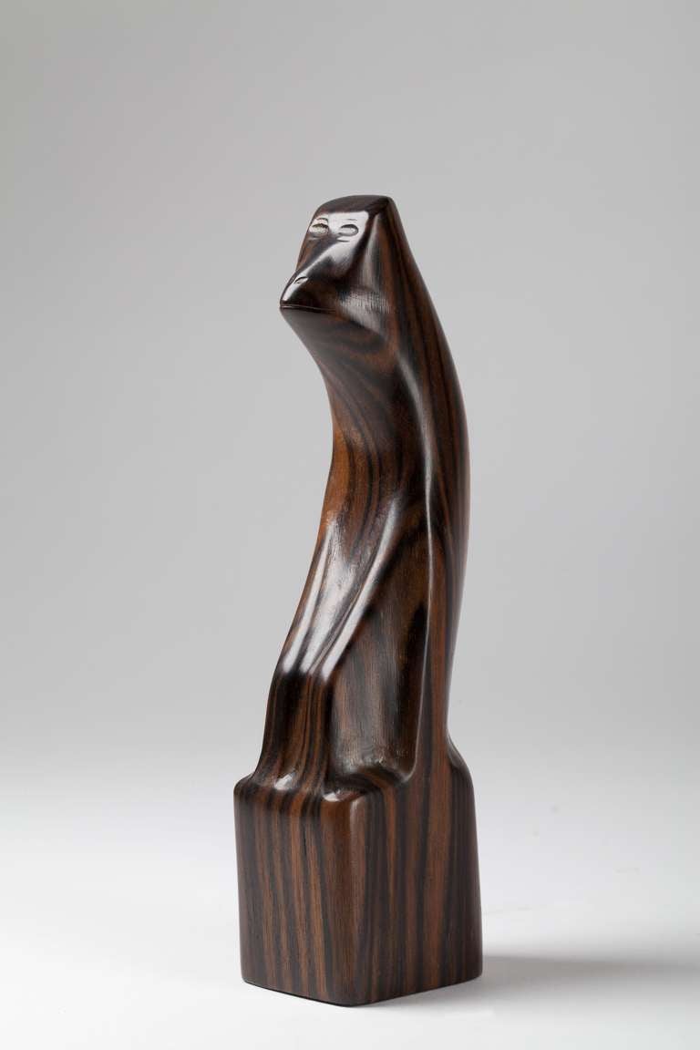 Bernard Richters, Art Deco sculpture of a monkey. The animal is carved out of rare rosewood in the 1920's. Richters was a master in using the natural patterns of the wood to emphasize the shapes and expression of the figure.