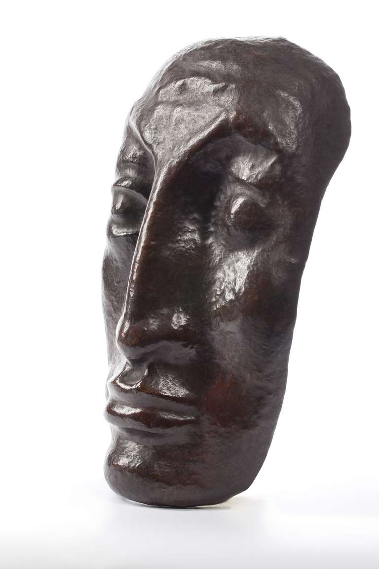 Expressive mask made from hammered copper by Hubert van Lith, 1920s