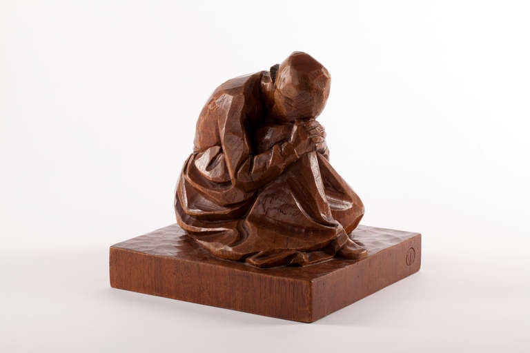 This powerful wooden sculpture of a grieving widow is made by the Dutch sculptor, painter, graphic artist and potter Tjipke Visser (1876-1955). 

Early 20th century Tjipke Visser was an Art Teacher at the Edam city Teekenschool for a number of
