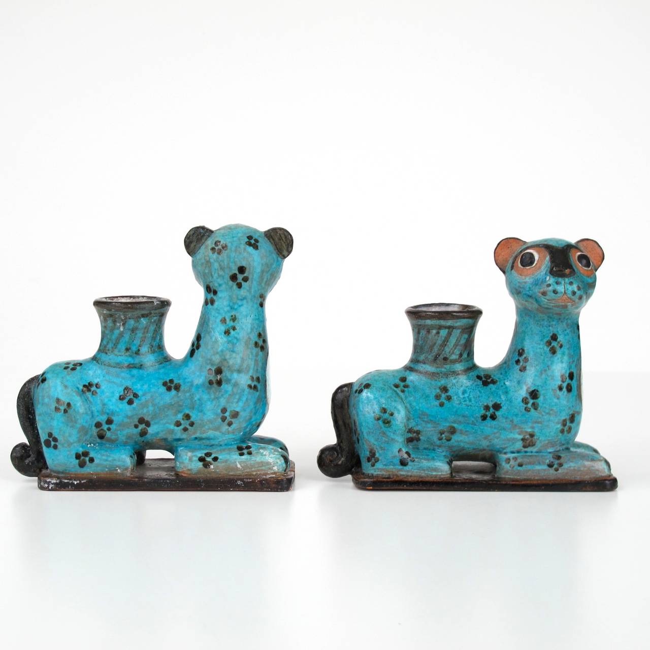 Set of Feline-shaped Polychrome Earthenware Candleholders, made by Dutch ceramist Lily ter Kuile (1926-) in the 1960s. Both of the pieces are in a good condition - one of them has got a small chip - and signed on the bottom with the artists monogram