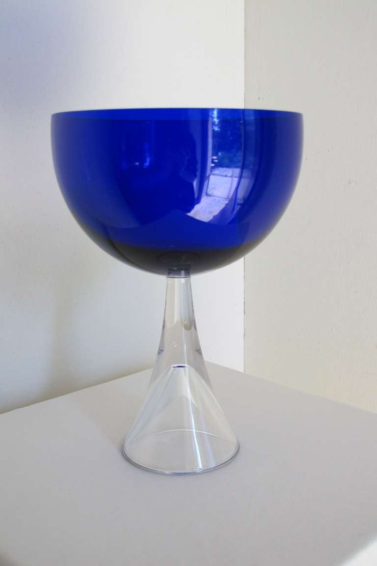 Industrial Design by Floris Meydam. This blue glass bowl on foot was produced at Glasfabriek Leerdam in 1960. It looks stunning in combination with the matching design in red or other Meydam designs like the yellow one-off on the last image.

Floris