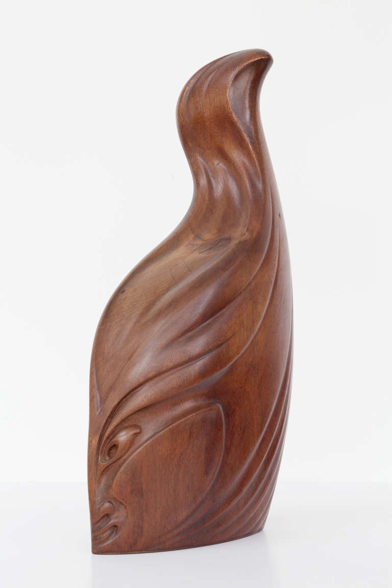 Great mahogany sculpture of female head by Jules Vermeire from the twenties with beautiful organic forms characteristic of the Amsterdam School. For this work Vermeire was also inspired by art from Africa and Oceania. The object is signed with the
