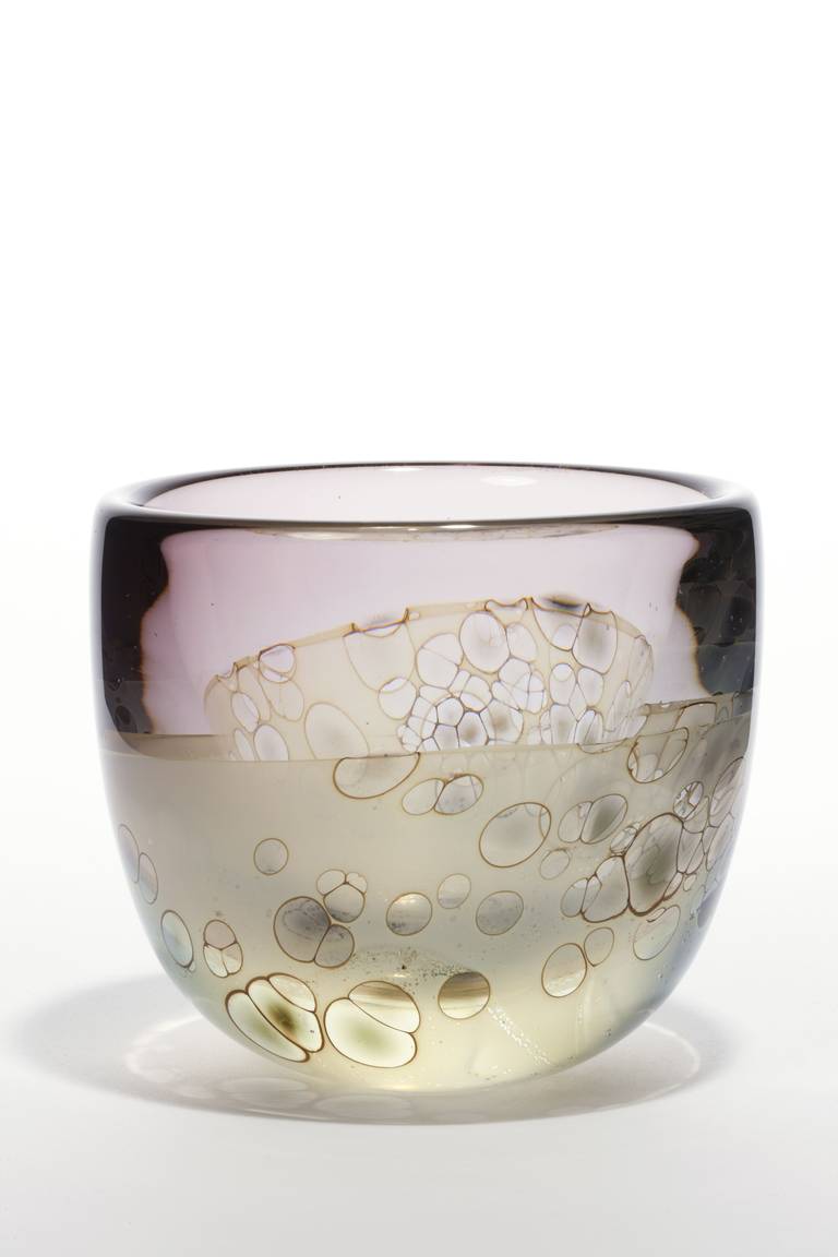 Unique glass vase by Willem Heesen from his theme 'Waterkant' (Waterside) with a beautiful nature inspired decor. Playful round shapes remind of air bubbles on the water or water organisms. Looking through the several layers of glass, a