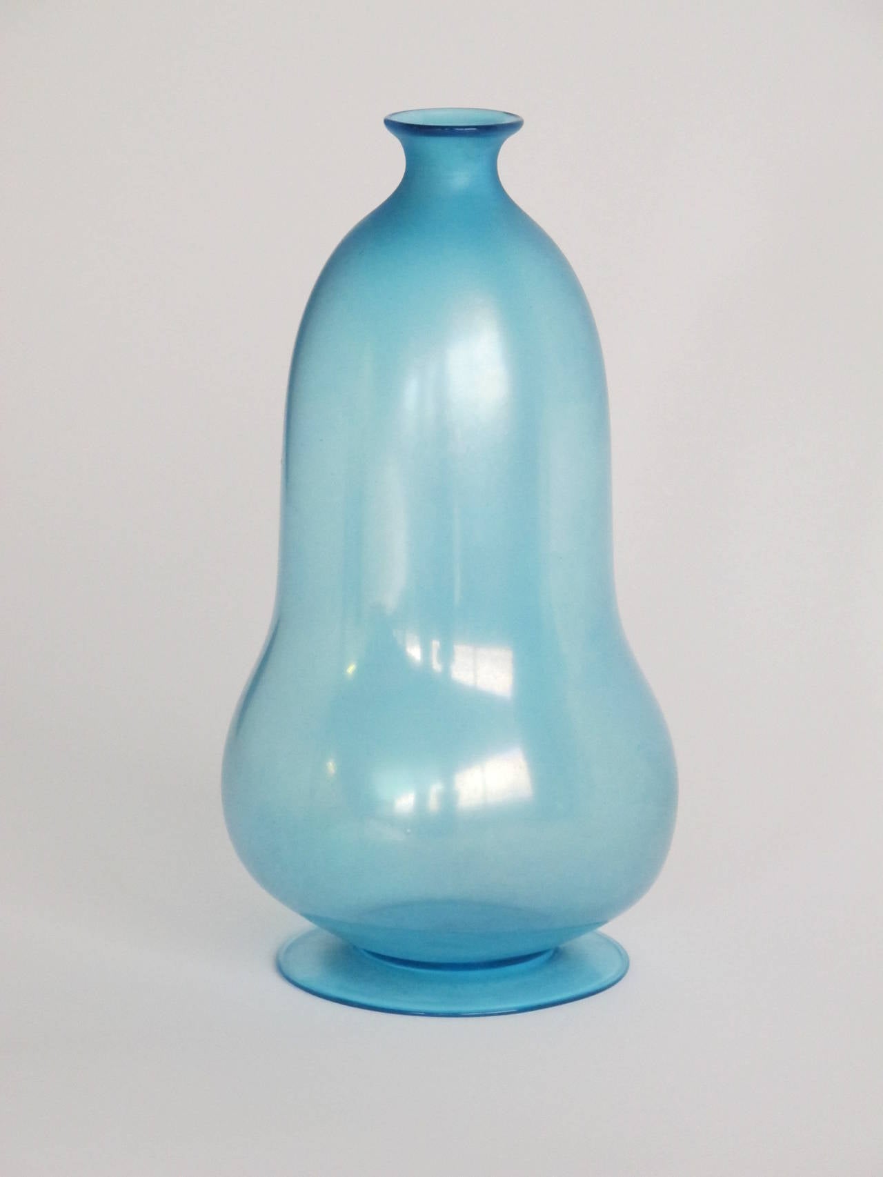 Elegant Art Deco vase from the 1920s. Early Dutch design by Andries Dirk Copier for Glasfabriek Leerdam, Thin blue blown glass with an organic Art Deco shape. Signed A.D. Copier, Leerdam Unica and numbered.