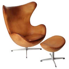Egg Chair and its ottoman by Arne Jacobsen, edited by Fritz Hansen in 1958