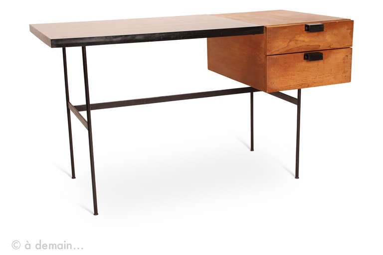 From 1953 to 1967, Pierre Paulin designs desks and chairs for the French manufacturer Thonet. Edited in 1954, this desk is one of the masterpieces of their collaboration. A design icon from the fifties. 

In good condition. Used by an accountant
