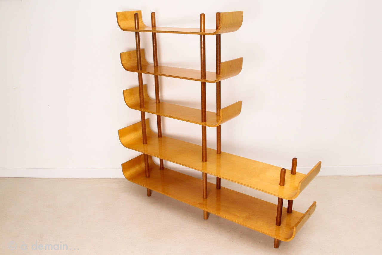 Very pretty 545 shelf by Willem Lutjens and edited by Gouda Den Boer in 1953. Made of mahogany and beech tree. Can be also used as a room divider.

Dimensions: Length of a large shelf: 132.5 cm.
Depth of a large shelf: 30 cm.
Length of a small