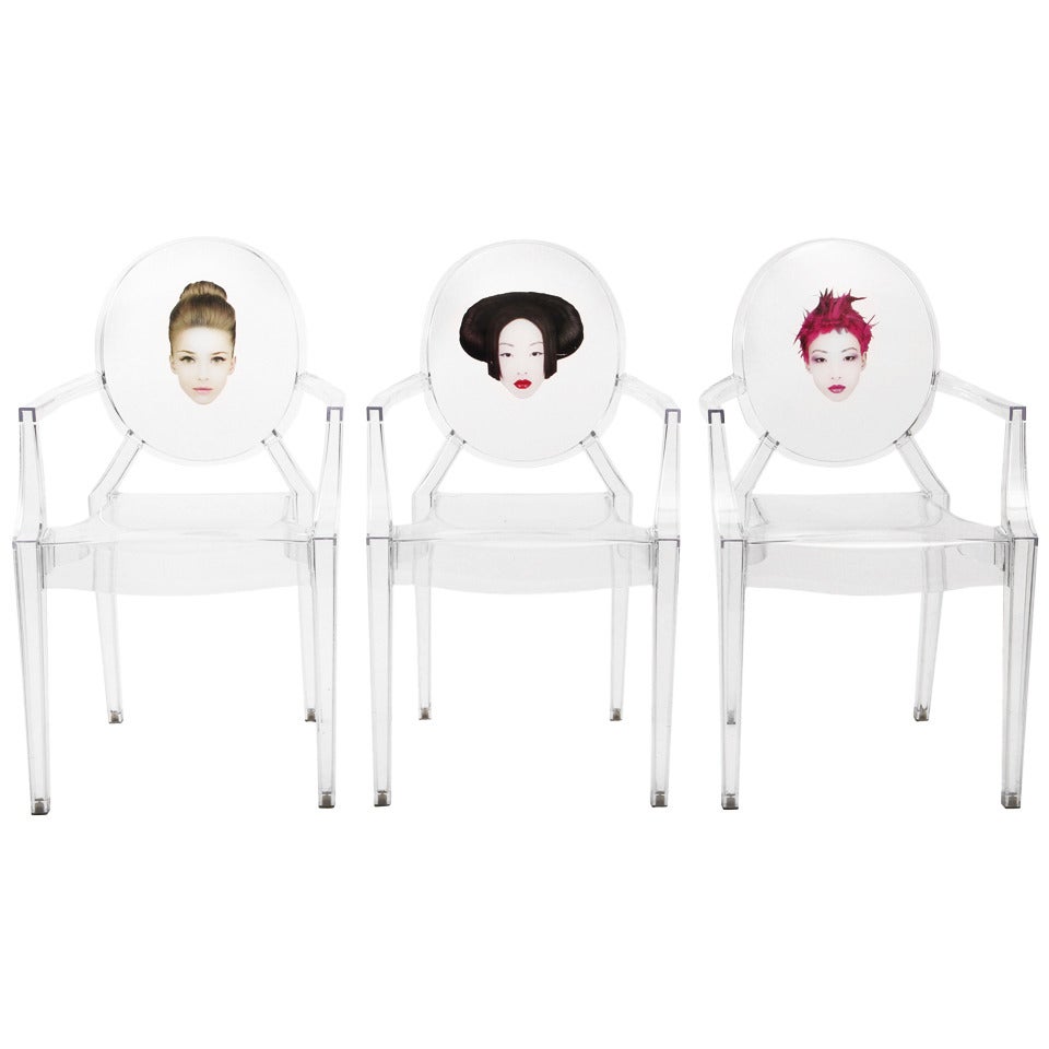 Three "Louis Ghost" chairs designed by Starck edited by Kartell, in 2003