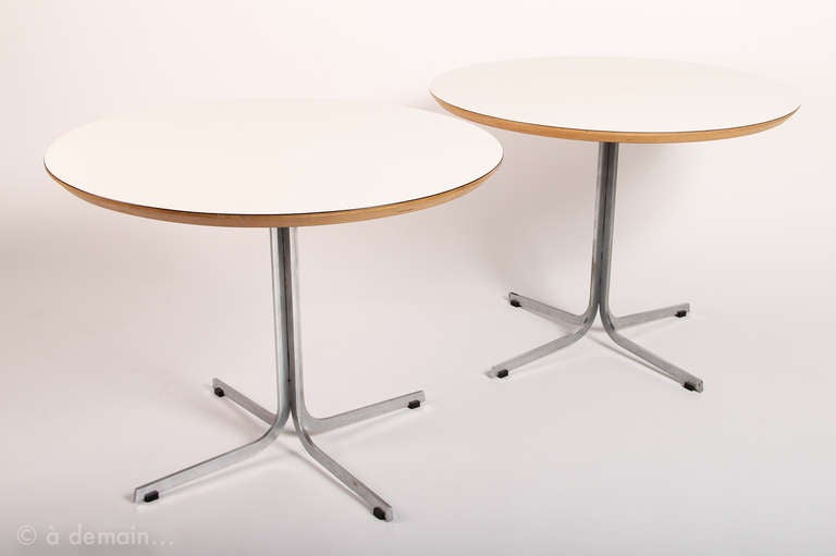 The feet of those two side tables or pedestals is sculptural and entirely fit the 