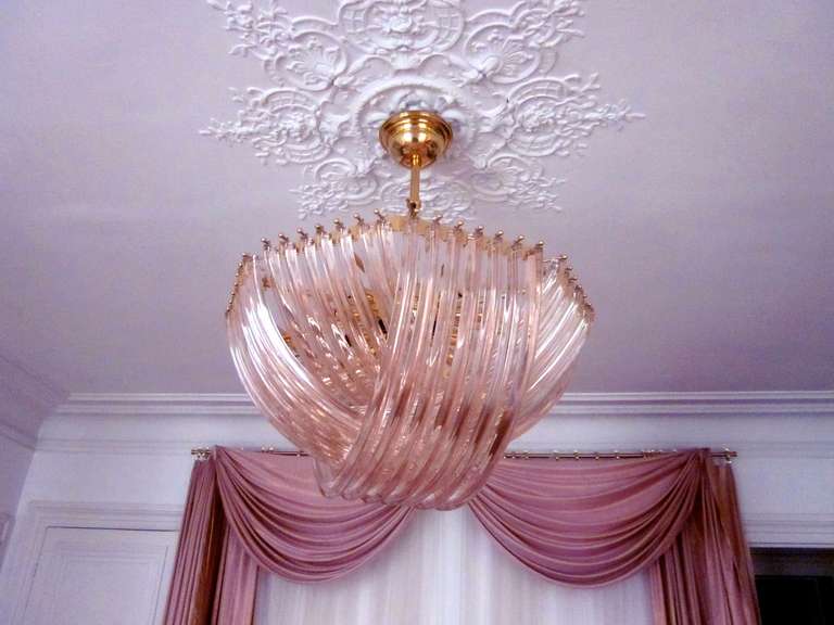 Murano, circa 1950, by Venini

Exceptional pink crystal chandelier, made of various pink crystal tubes.
Width at the ceiling 19 cm
Overall width 75 cm
Overall height approx. 90 cm

DELIVERY INCLUDED IN THE PRICE