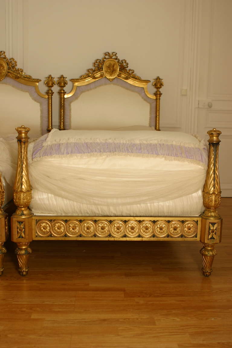 Ceremonial twin beds, France, circa 1860- 1875

A pair of magnificent, solid gilt bronze beds, Louis XVI style, complete with medallions, cherubs, bows. that sort of luxurious piece of furniture, would have been presented on a velvet covered