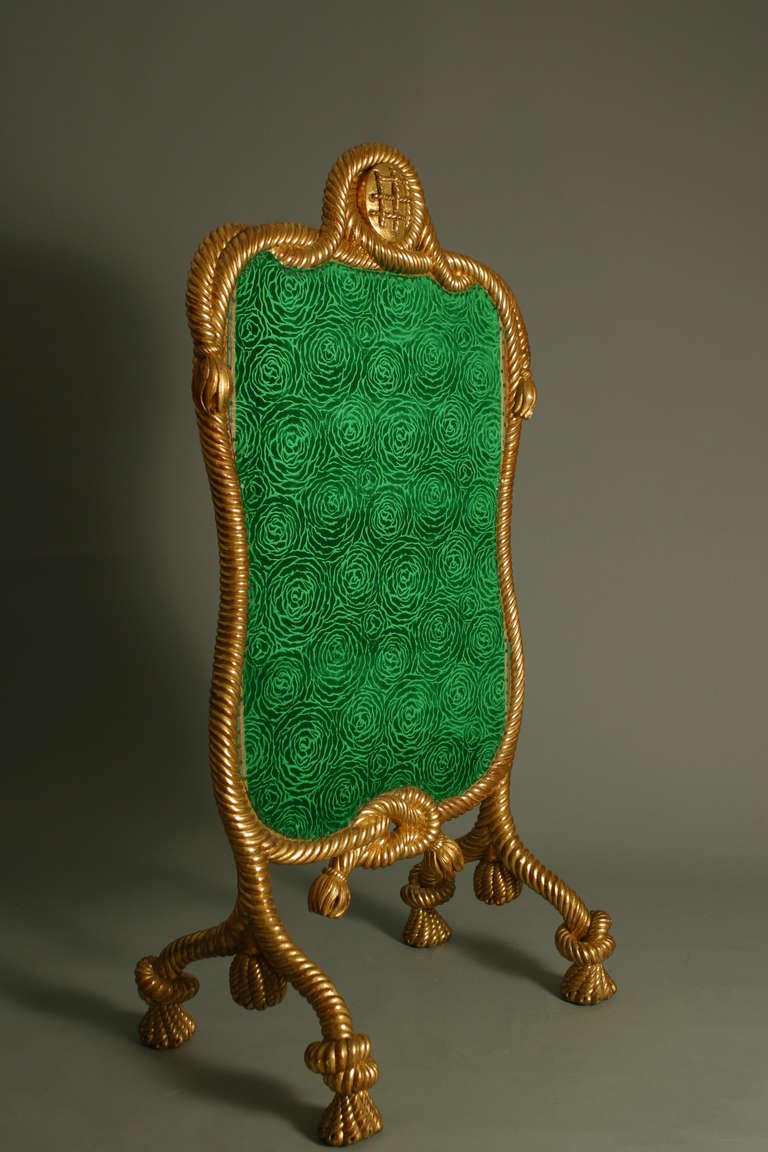 Fire screen , Second Empire, circa 1850 - 1870 

This rare and superb carved and gilt wood '' Corded '' design, is upholstered on one side with a rich antic emerald silk velvet and on the other a matching antic silk satin...

The '' Corded ''