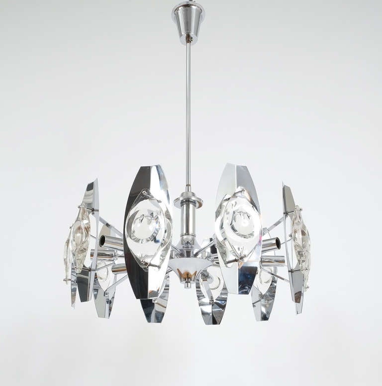 Gaetano Sciolari Impressive Chrome Glass Lens Chandelier lamp , Italy 1960. Stunning 25.6 inch Chandelier by Gaetano Sciolari with very large glass lenses and chrome finish. The condition is excellent, the light holds ten bulbs in total. Overall