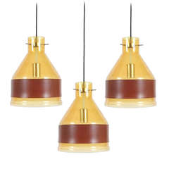 Set of Three J.T. Kalmar Yellow Glass Pendant Lamps with Leather Belts