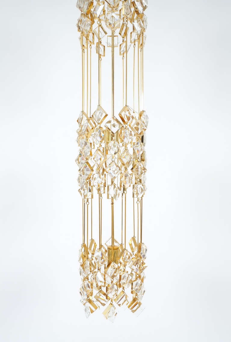 Golden Brass and Crystal Column Chandelier by Palwa For Sale at 1stdibs