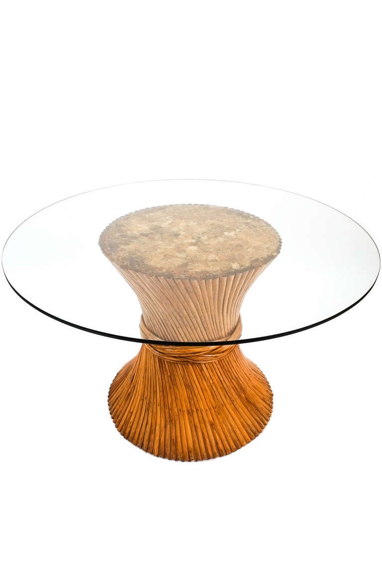 Vintage McGuire sheaf of bamboo dining table in very good condition. Please note that the round glass tabletop is an optional feature and the table might either be shipped with or without the 49.2