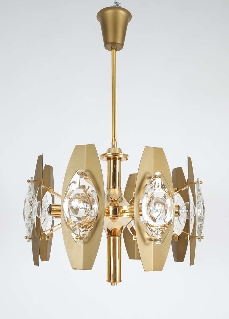 Large Lens Chandelier by Gaetano Sciolari with polished and matte gold finish in excellent condition.
The fixture has been professionally cleaned and polished.