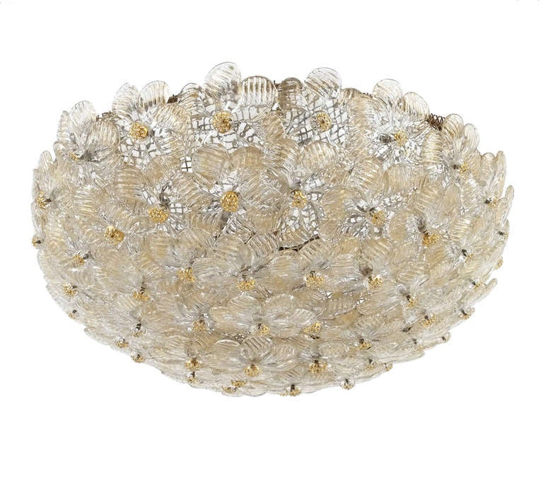 Beautiful petite Murano glass flush mount by Barovier e Toso.
The fixture holds up to 3 bulbs.