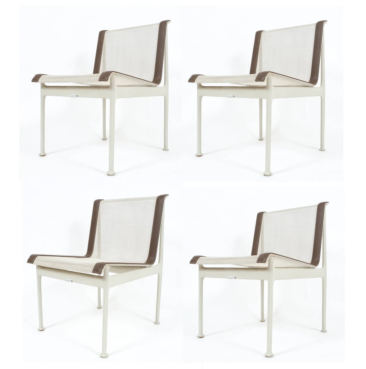 Nice set of four hard to find Richard Schultz outdoor or indoor lounge chairs for Knoll 1966. The set includes four chairs, with white mesh seats and brown trim. The condition is good, some minor wear to the lacquered cast bases. 