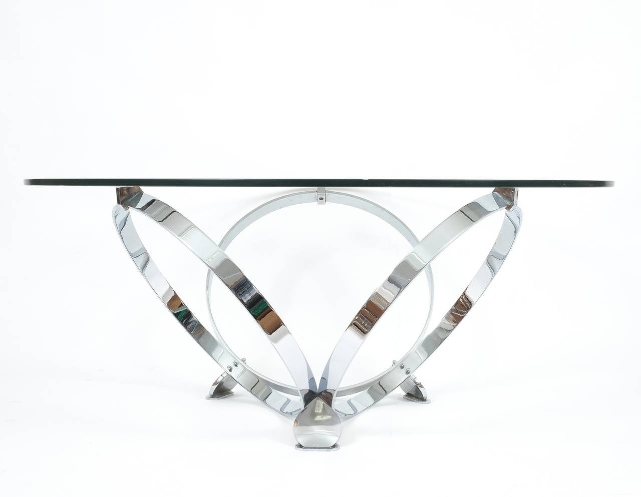 Stylish chrome ring table made from solid chromed metal rings and a floating glass top. Please note that the table will be shipped without the glass table top. We recommend to have the glass top customized locally as shipping fees will rather high.