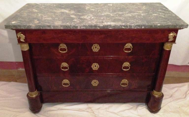 19th French Empire commode in mahogany flame