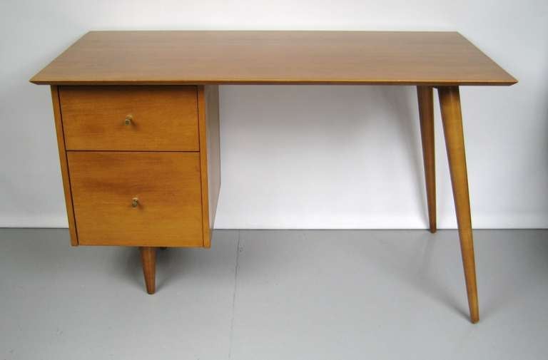 Sleek minimalist design on this McCobb desk.  Rare Brass pulls.  In wonderful condition, 100% Original Finish.