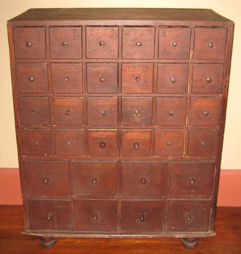 This is a Great 19th c. 32 Draw Apothecary Cabinet with Original Finish. From the Hudson Valley of New York. Great piece that can be used in a home or commercial space. The patina is wonderful on this. 

Feel Free to Call 201-410-0025 or Email