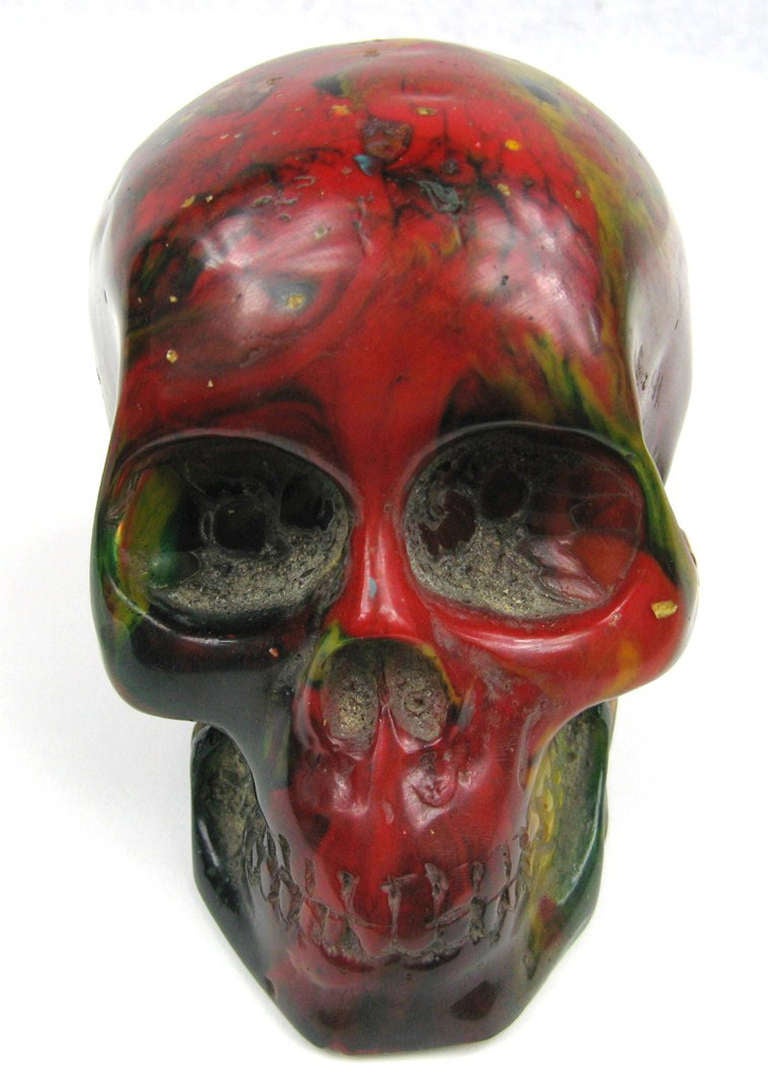 Wonderful color on this end of day Bakelite skull. A showstopper! Vibrant Reds, Greens and more

Feel Free to Call 201-410-0025 or Email catalincraze@gmail.com for any additional questions you may have.