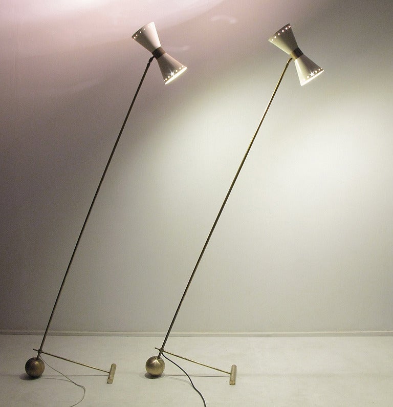 A pair of large and very impressive 1960s Italian floor lamps in the style of Arredoluce.

Each lamp is an imposing 185cm (6' 2