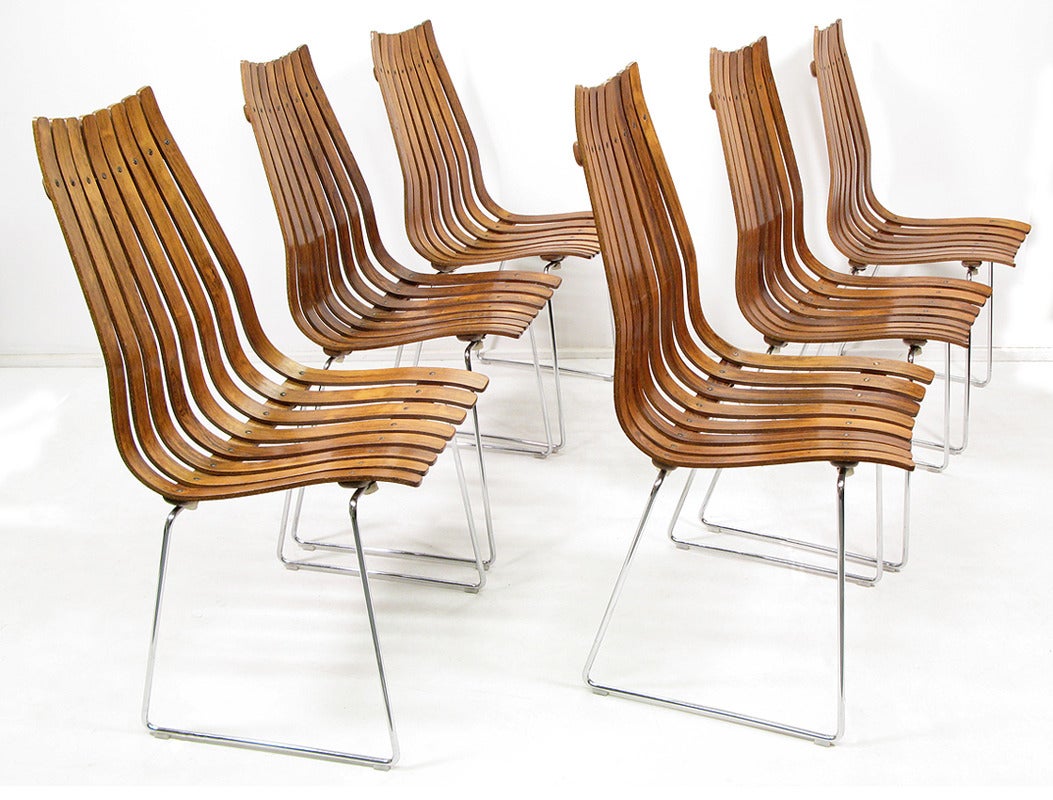 Six original 1960s rosewood Scandia chairs by Hans Brattrud for Hove Mobler.

These graceful high-back chairs are in excellent structural and aesthetic condition. The rosewood grain is unfaded, the chromed steel clean and without pitting.

In